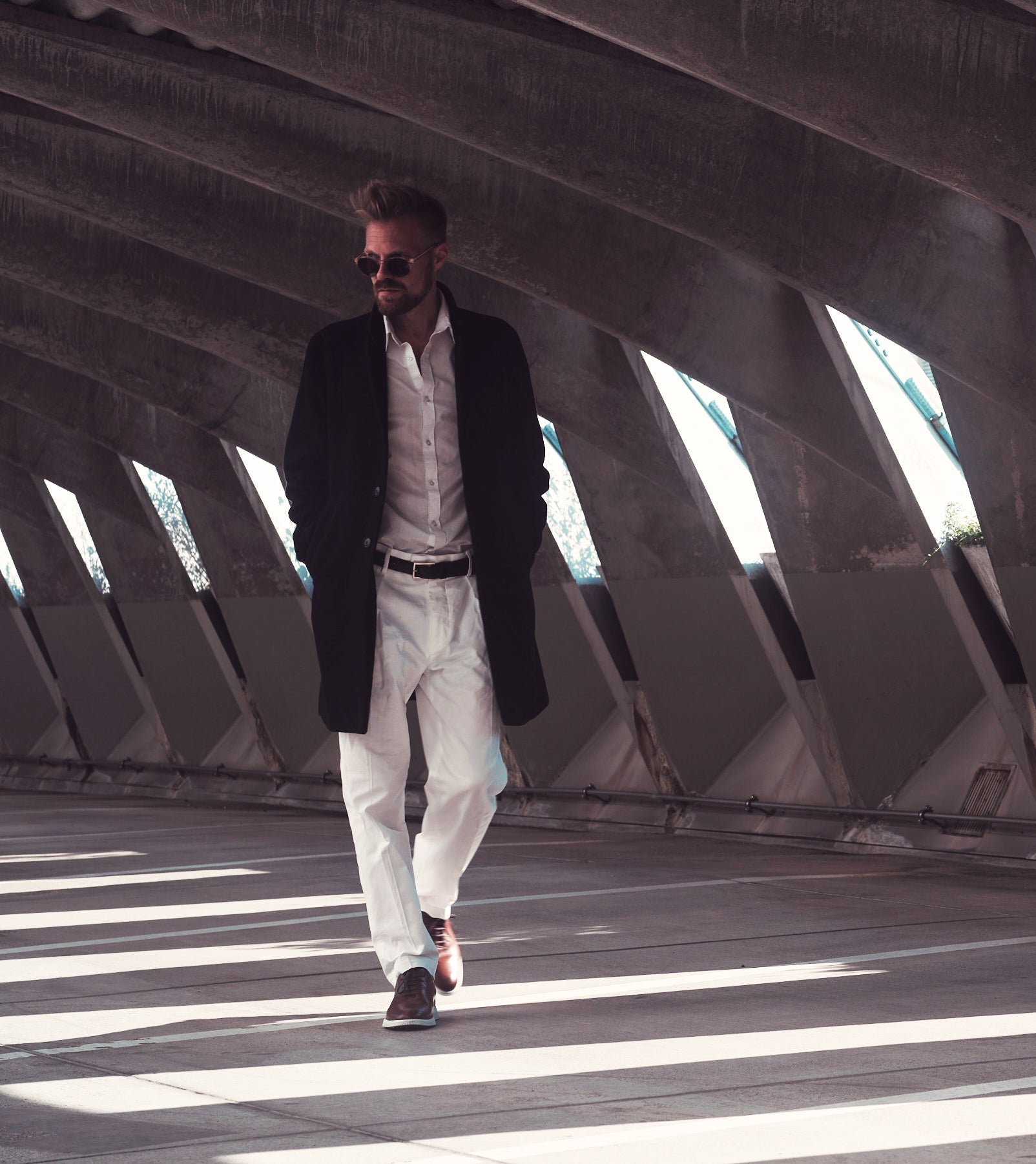 Model walking in RONIN tan. KANREY derby shoes in tan.