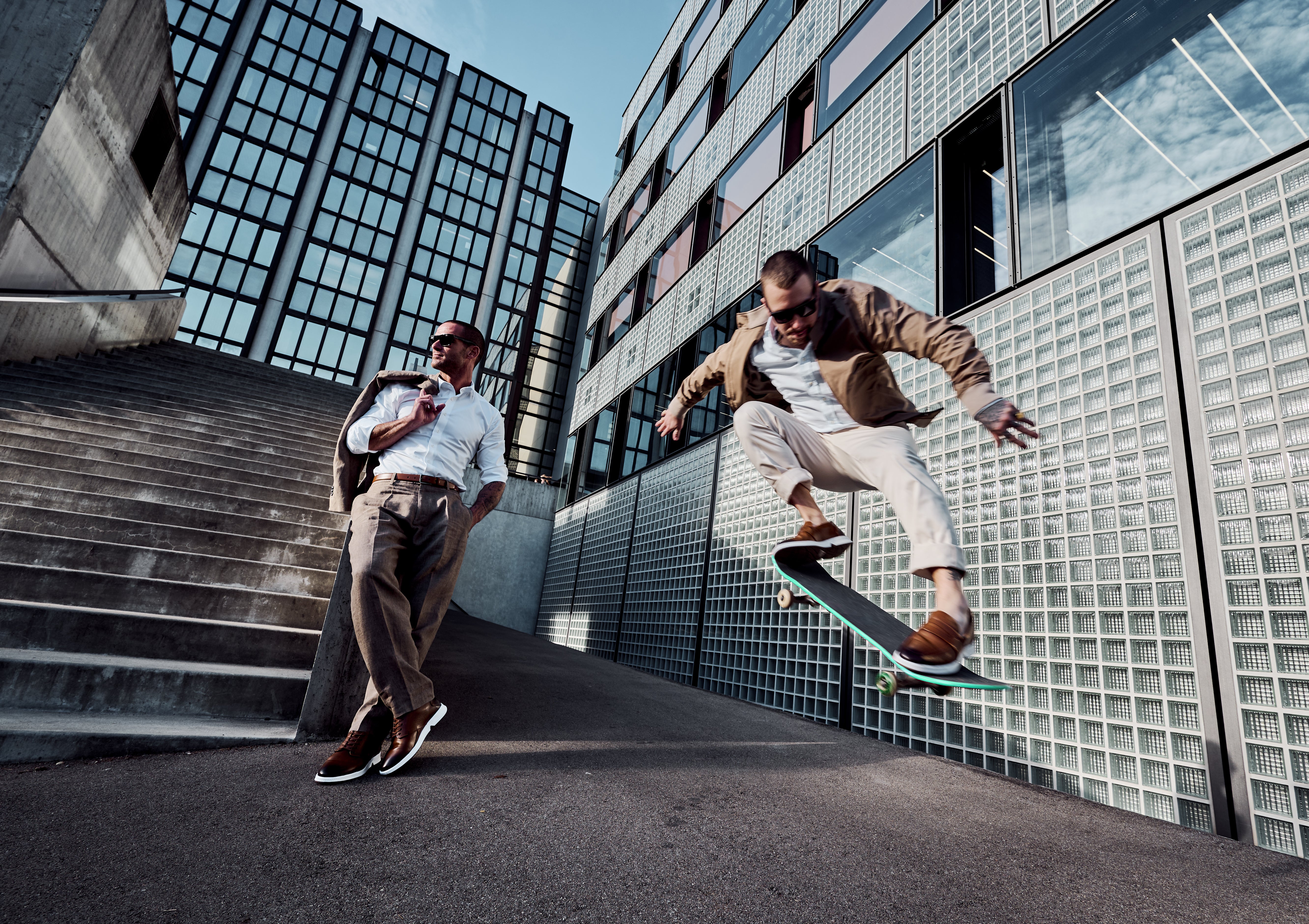 Model and skater shown together in lifestyle setting. KANREY fashion shoes.